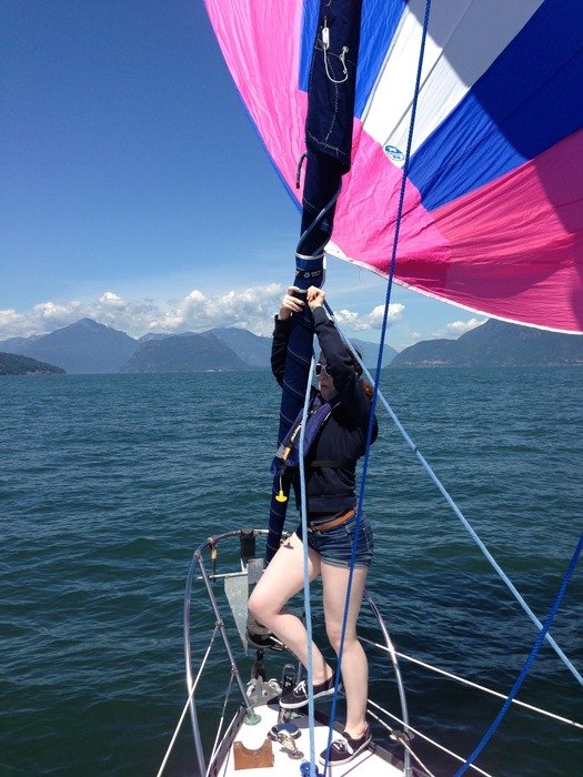 Photo of sailing girl on the sailboat