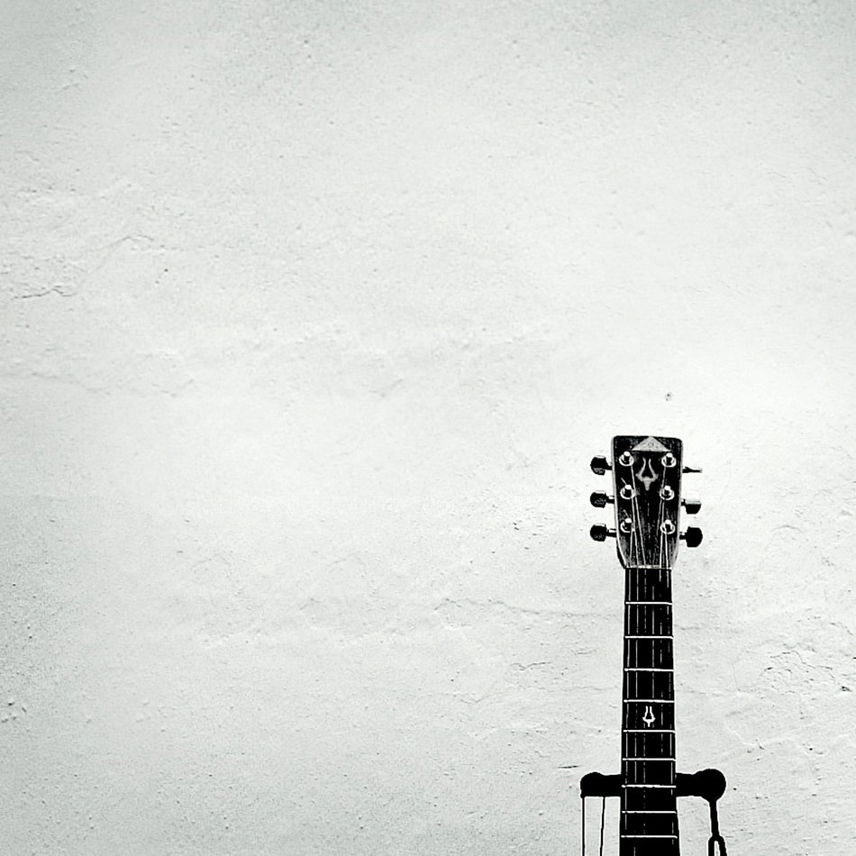 fingerboard of electric guitar on a white background