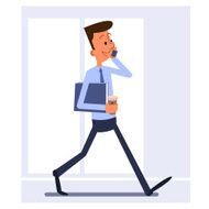 Businessman walking and talking on the phone