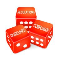 regulations guidelines and compliance words on three red dice