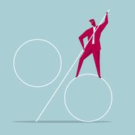 Businessman builds big percent sign