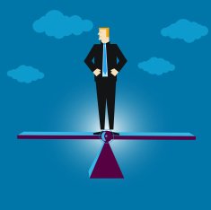 Balancing businessman