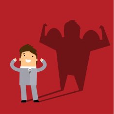 Business man casting a shadow of an athlete