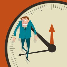 Businessman hangs on an arrow of clock