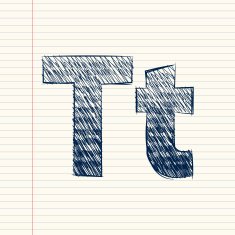 letter T sketch in a notebook