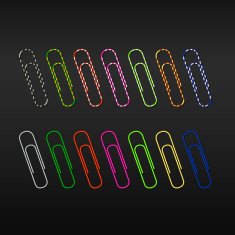 Realistic paper clips on a dark background