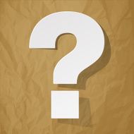 White paper question mark on a crumpled brown background