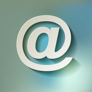 Paper email symbol on a checkered paper background