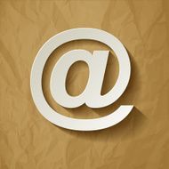 Paper email symbol on a crumpled paper brown background