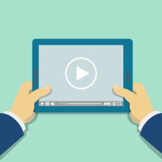 Human hand holds tablet computer with video player Media screen