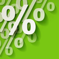 Percents white paper in the corner on a green background