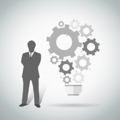 Bussiness man with abstract gear ligh bulb