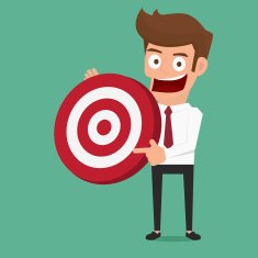 Businessman holding a big target