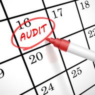 audit word circle marked on a calendar