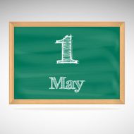 May 1 inscription in chalk on a blackboard