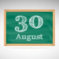August 30 inscription in chalk on a blackboard