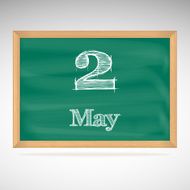 May 2 inscription in chalk on a blackboard