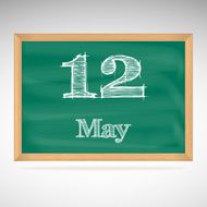 May 12 inscription in chalk on a blackboard