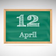 April 12 inscription in chalk on a blackboard
