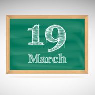 March 19 inscription in chalk on a blackboard