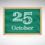 October 25 inscription in chalk on a blackboard