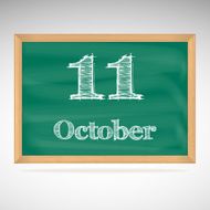 October 11 inscription in chalk on a blackboard
