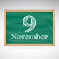 November 9 inscription in chalk on a blackboard