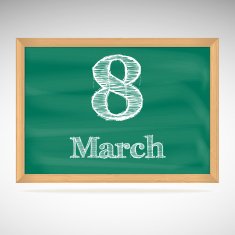 March 8 inscription in chalk on a blackboard