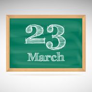 March 23 inscription in chalk on a blackboard