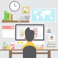 Graphic designer working with computer in home office workspace