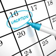 vacation word circle marked on a calendar