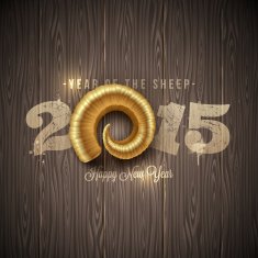 New years greeting with golden horn of a sheep