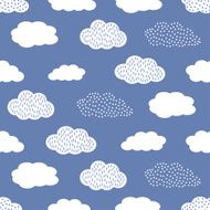 Seamless pattern with white clouds on blue background