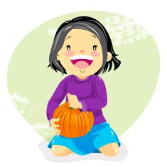 Little girl holding her pumpkin