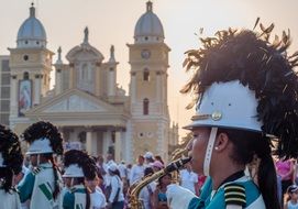 musician marching with trombone