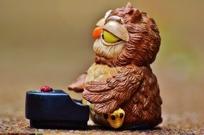 funny owl at piano, plastic toys