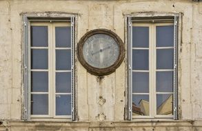 barometer on the facade of an historical building