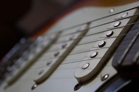 closeup photo of electric guitar instrument