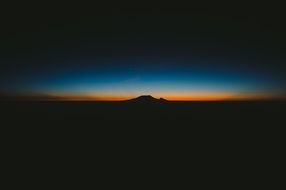Sunset on the horizon of the mountain