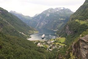 ship in geiranger fjord in norway