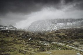 cloud on top of the mountain