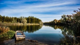 boat at the quiet forest lake landscape