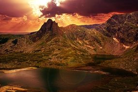 stunning landscape of mountains against a fiery sunset