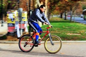 man cycling in the park