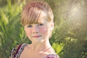 portrait of Blonde girl with blue eyes