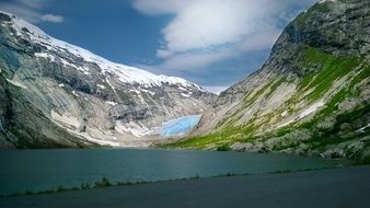 valley at the foot of a glacier in the alps