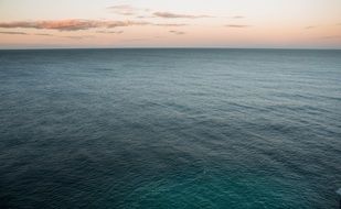 ripples on the ocean at sunset