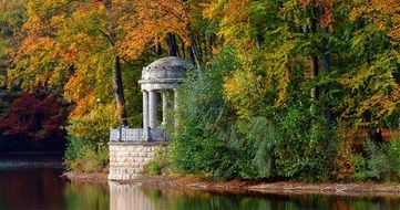 autumn landscape with falling leaves