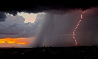 pink lightning in a stormy sky