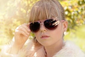 Little girl in sunglasses